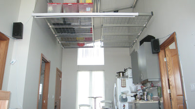 Auxx-Lift installed above kitchen with high ceiling.